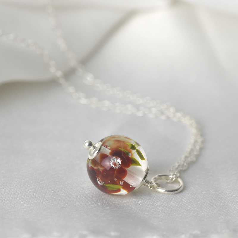 Necklace with burgundy glass flowers
