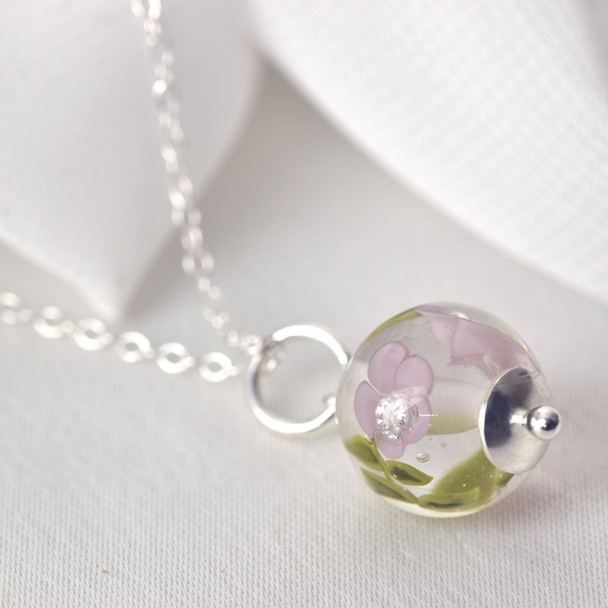 Necklace with lilac glass flowers