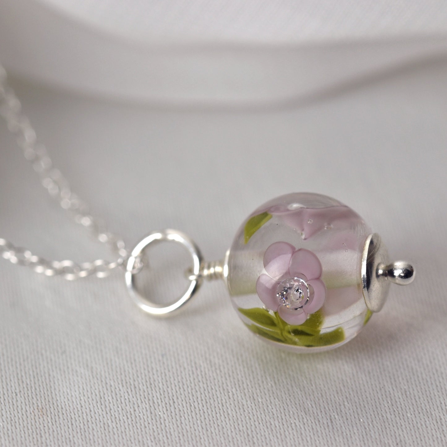 Necklace with lilac glass flowers