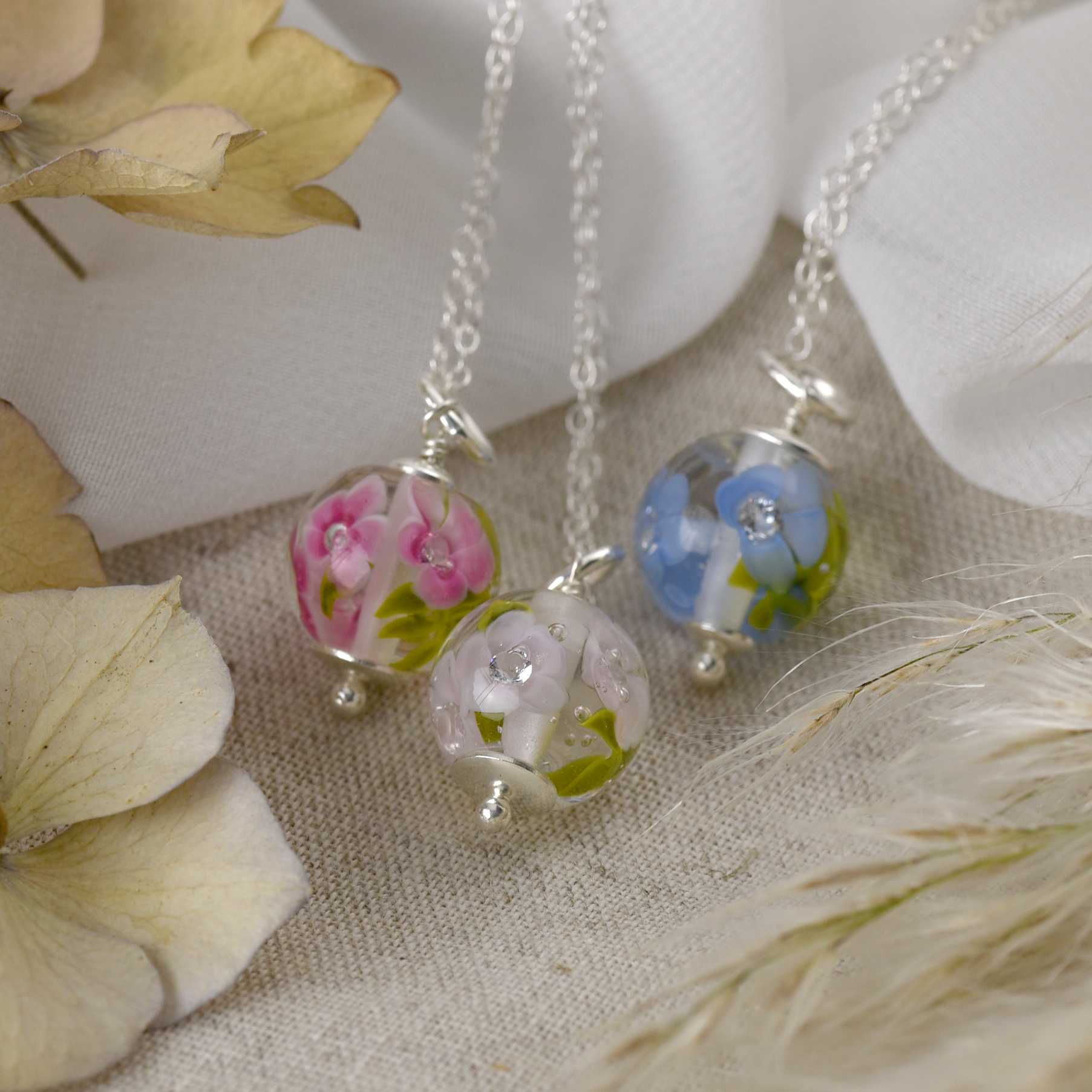 Glass flower pendant on sale necklace