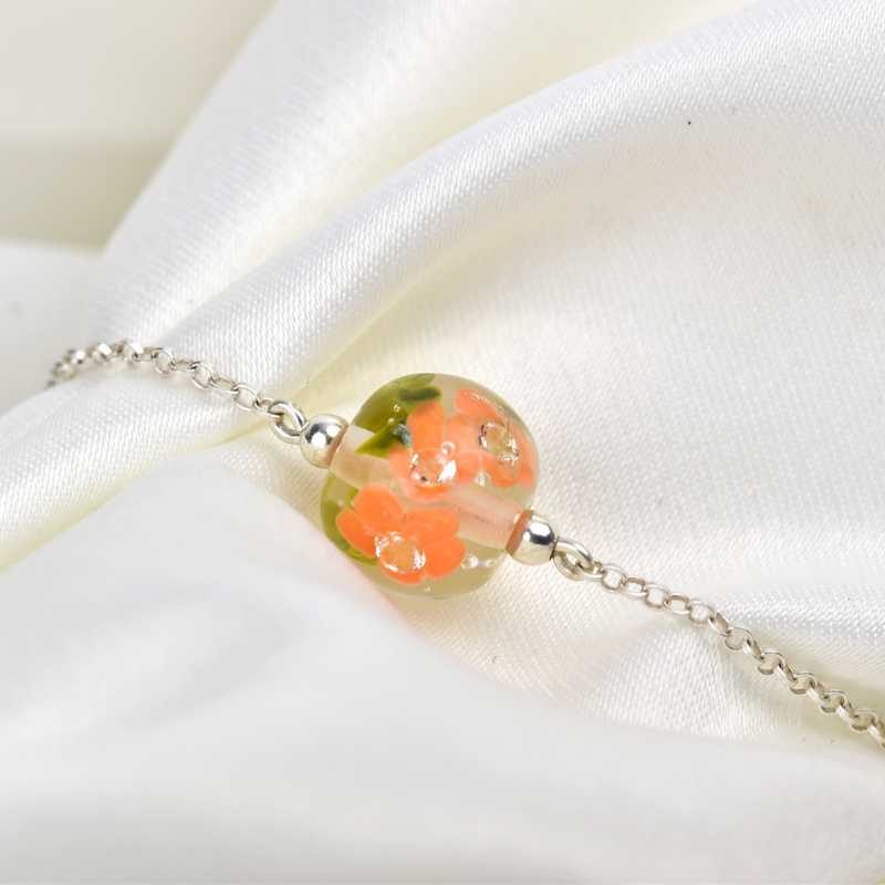 Bracelet aux fleurs de verre abricot